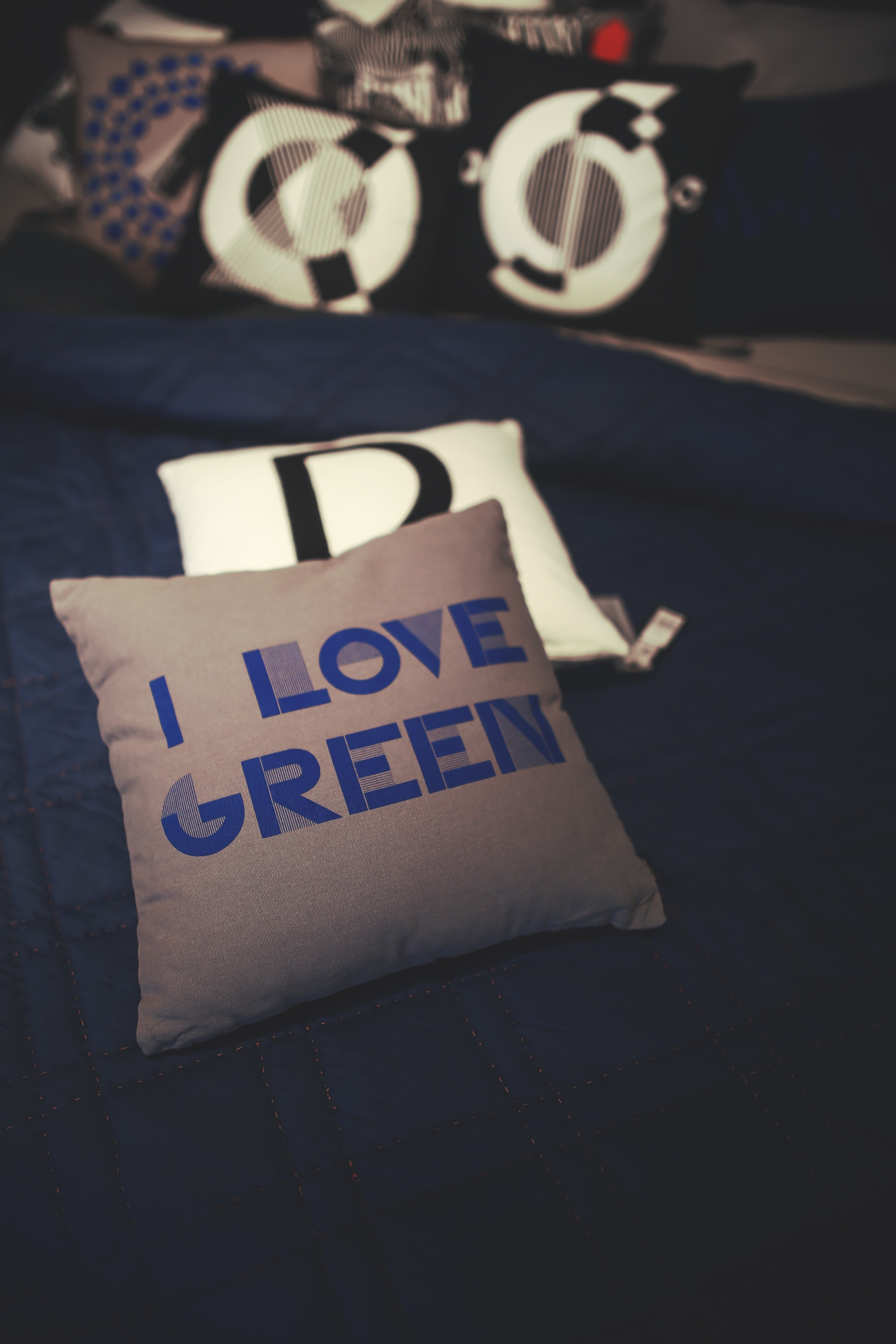 selective focus i love green print pillow