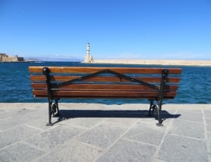 brown wooden bench with black metal frame thumbnail