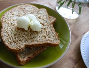 toast with butter green white dinnerware thumbnail