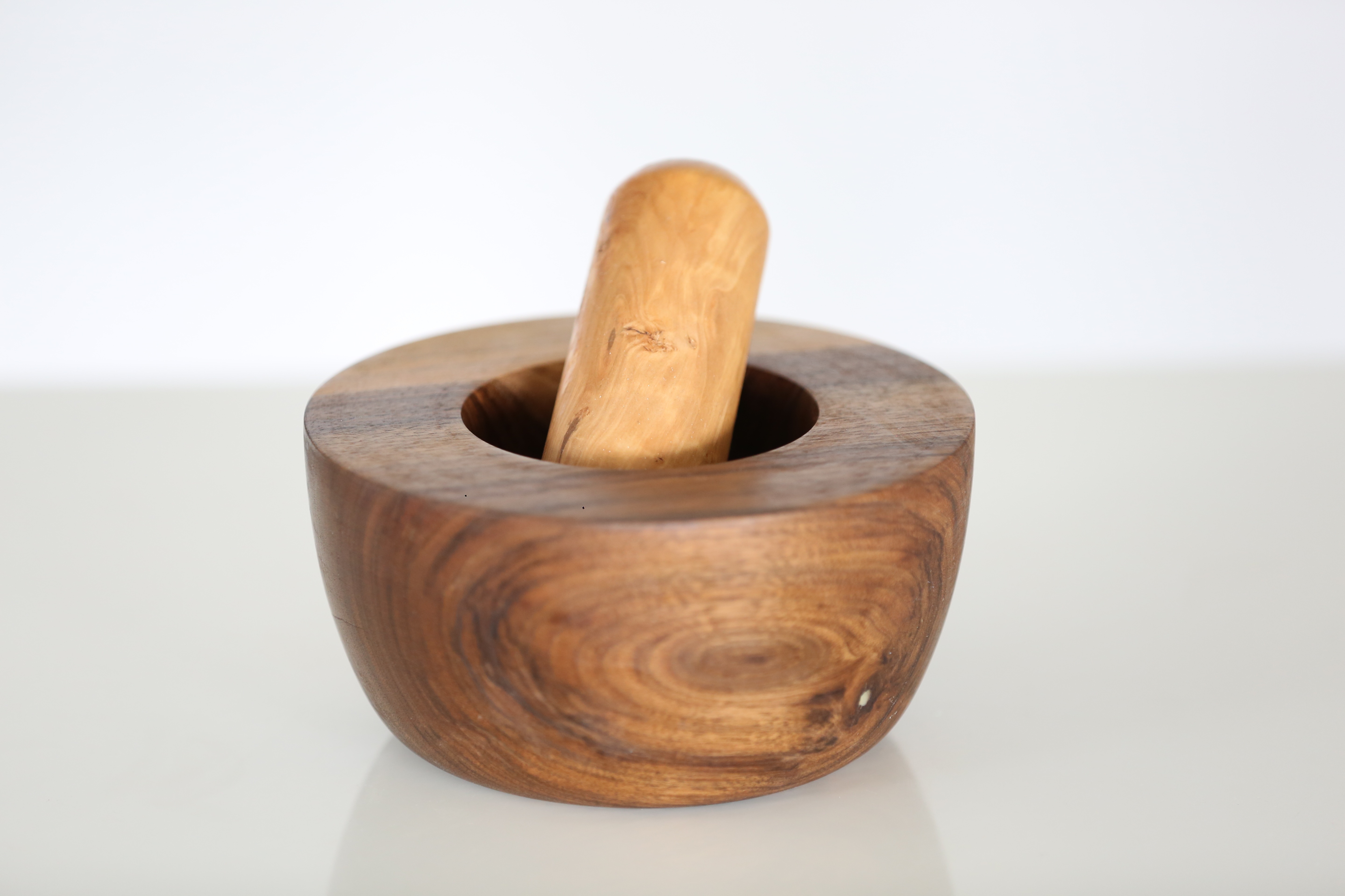 brown wooden round grinder bowl set
