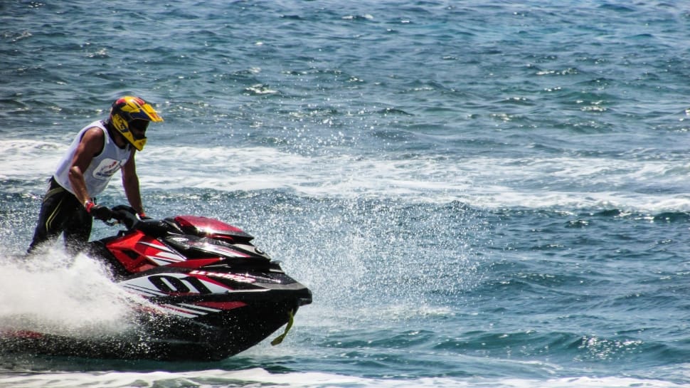 red and black personal watercraft preview