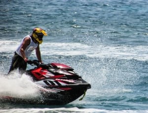 red and black personal watercraft thumbnail