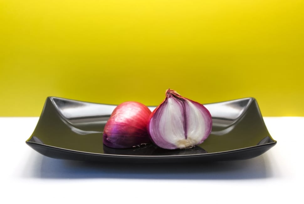 onions and black ceramic rectangular plate preview
