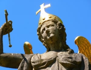 angel with gold cross crown statue thumbnail