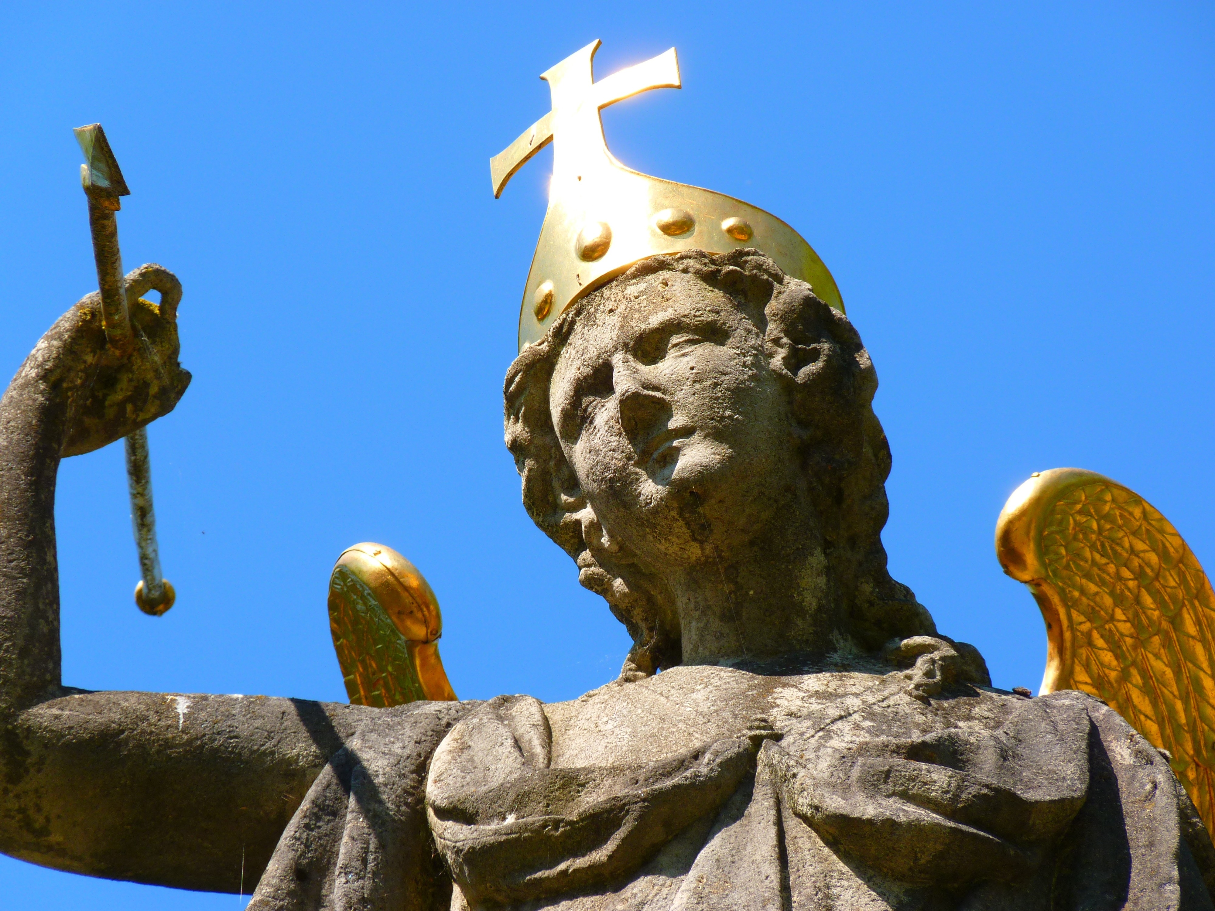angel with gold cross crown statue