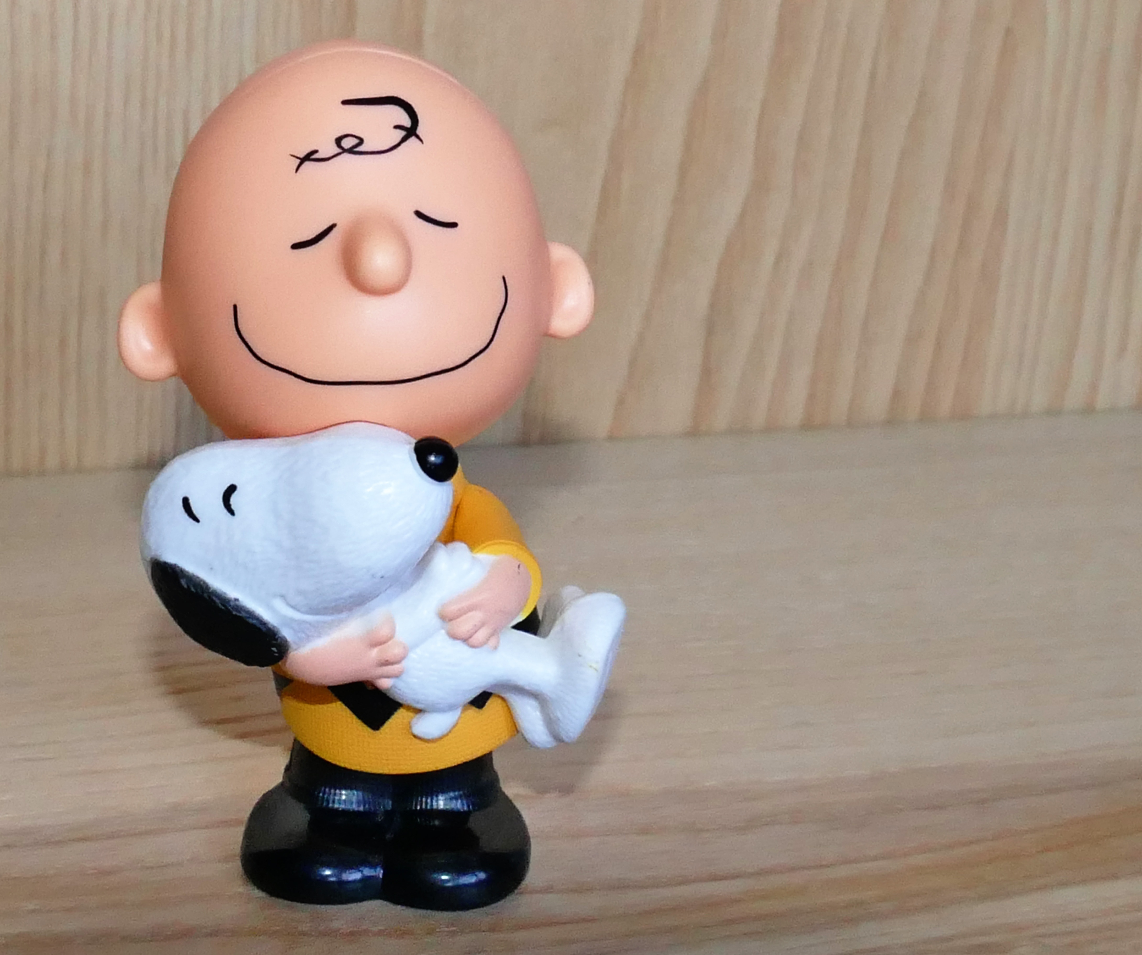 charlie brown and snoopy figurine