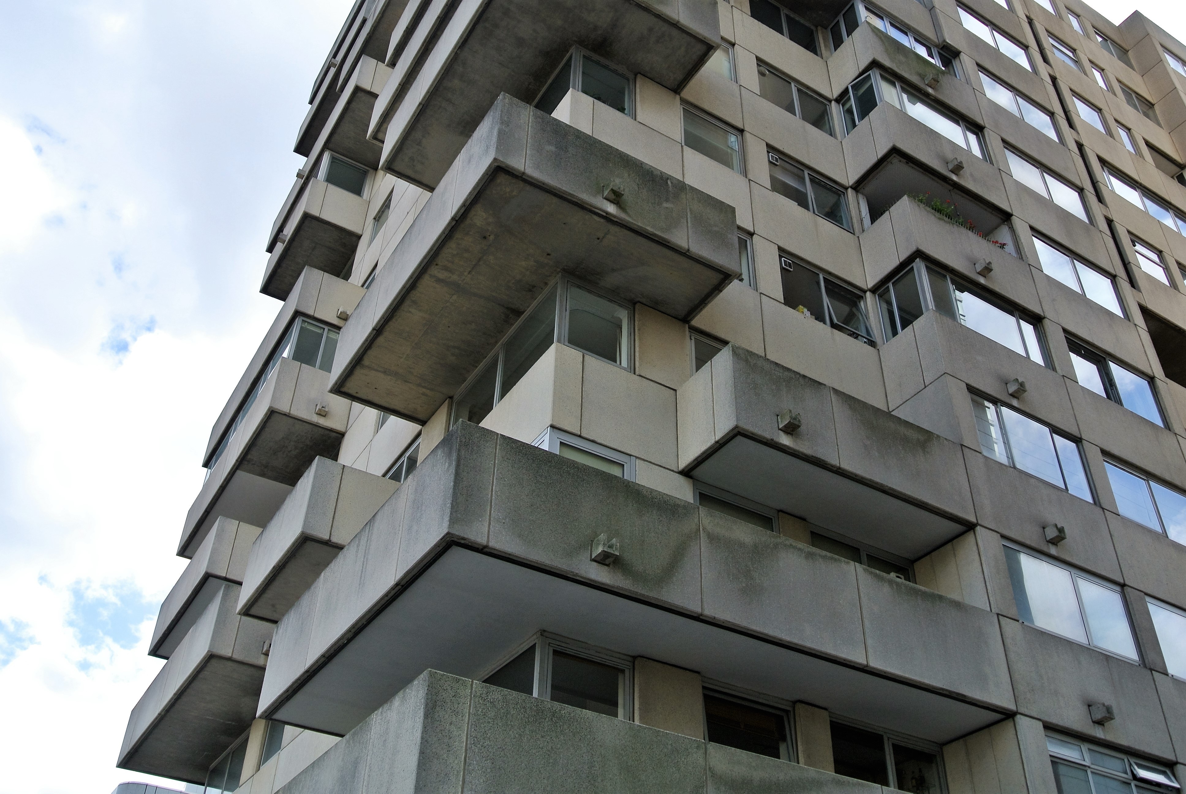 gray concrete high rise  building