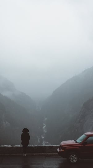 person in black hoodie facing in river valley thumbnail