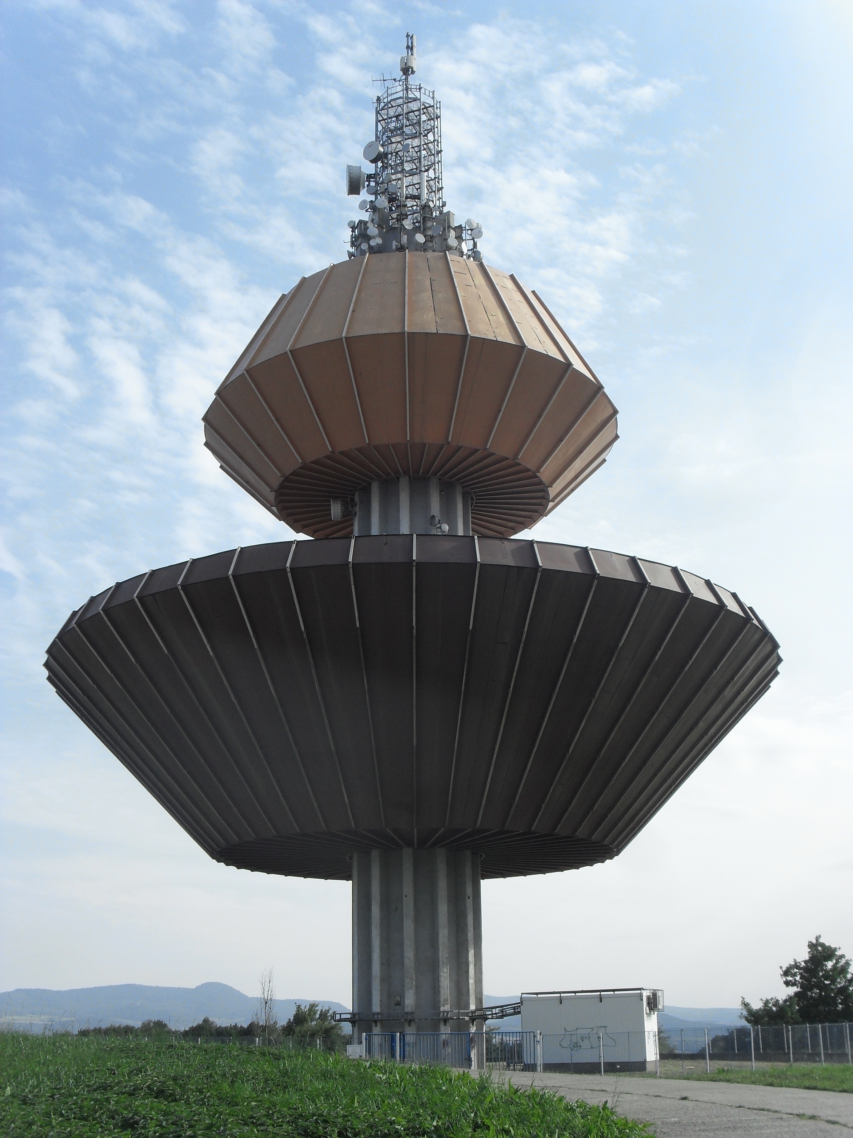brown and gray concrete network tower