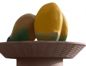 artificial yellow-green mango fruit in brown woven fruit bowl thumbnail