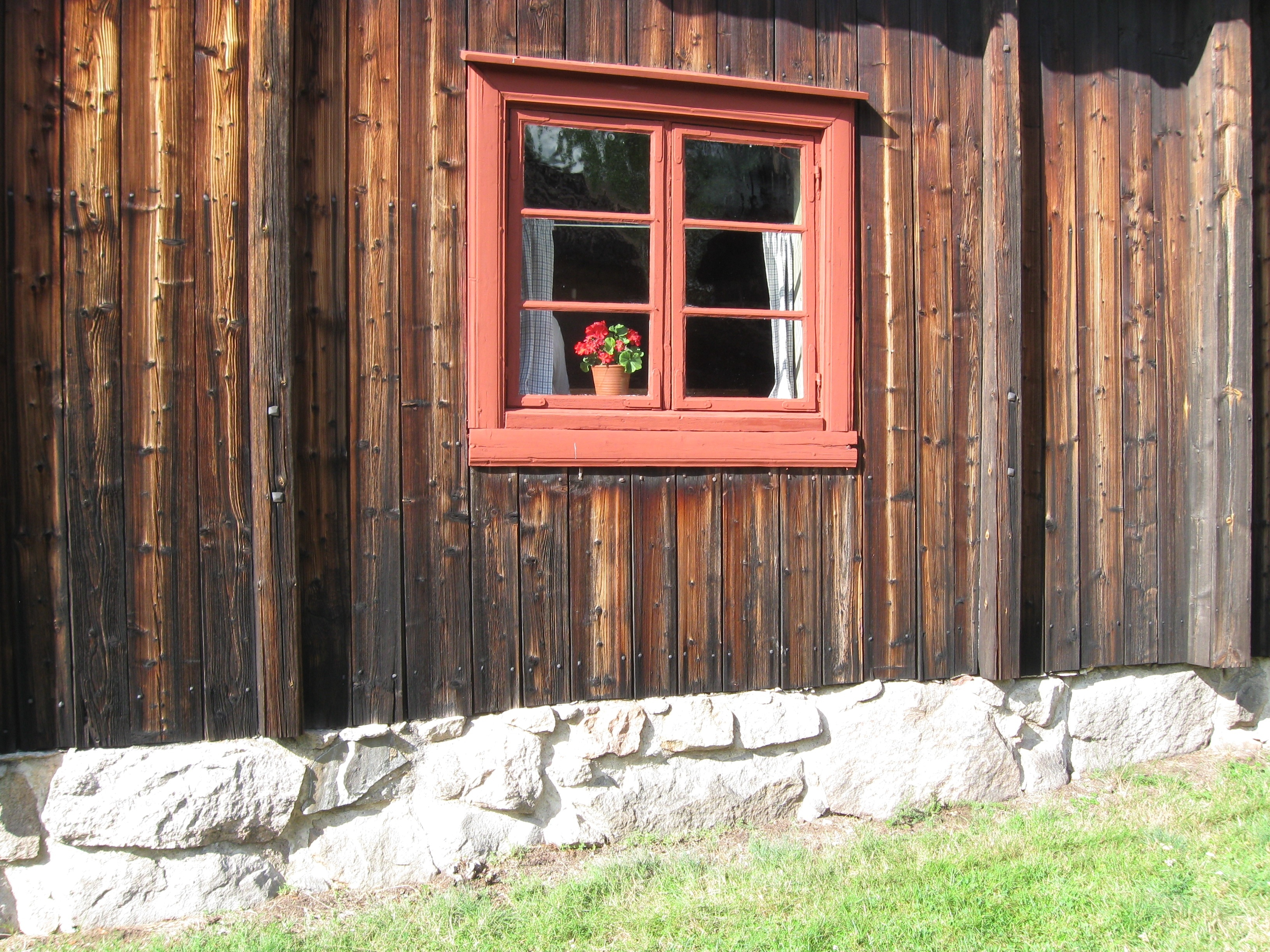 pink wooden window frame with glass