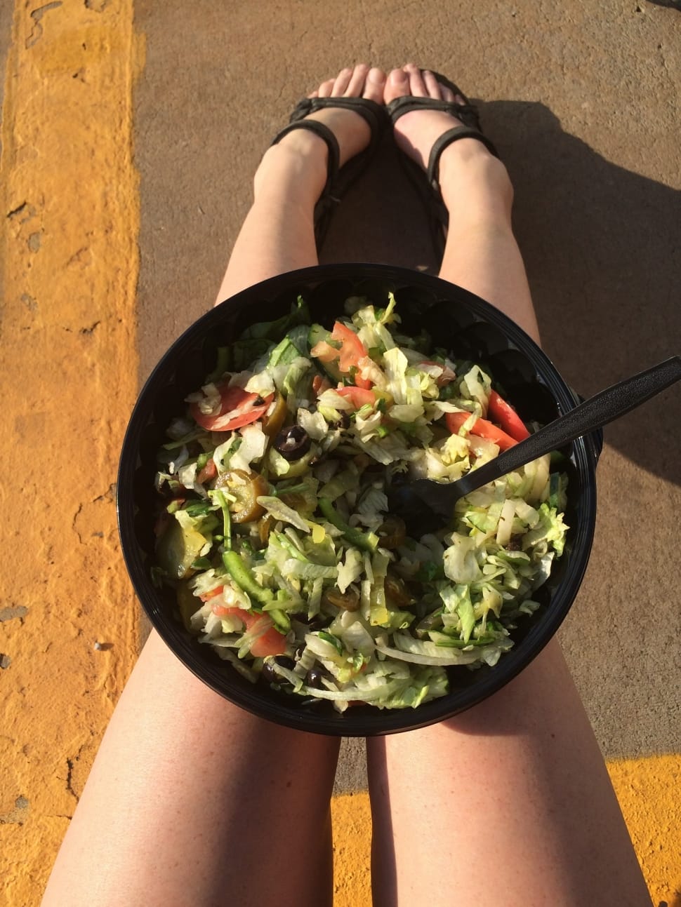 mixed vegetables salad in a black bowl preview