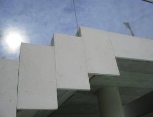 white concrete pillared building thumbnail