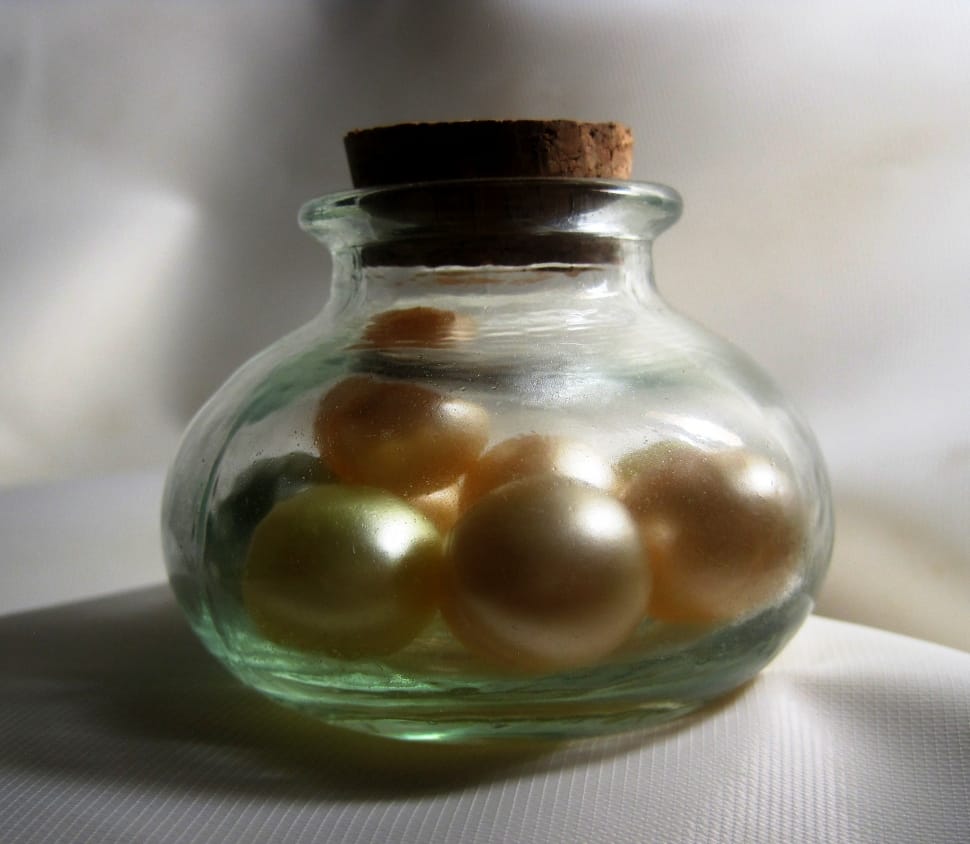 gold pearl in glass bottle preview