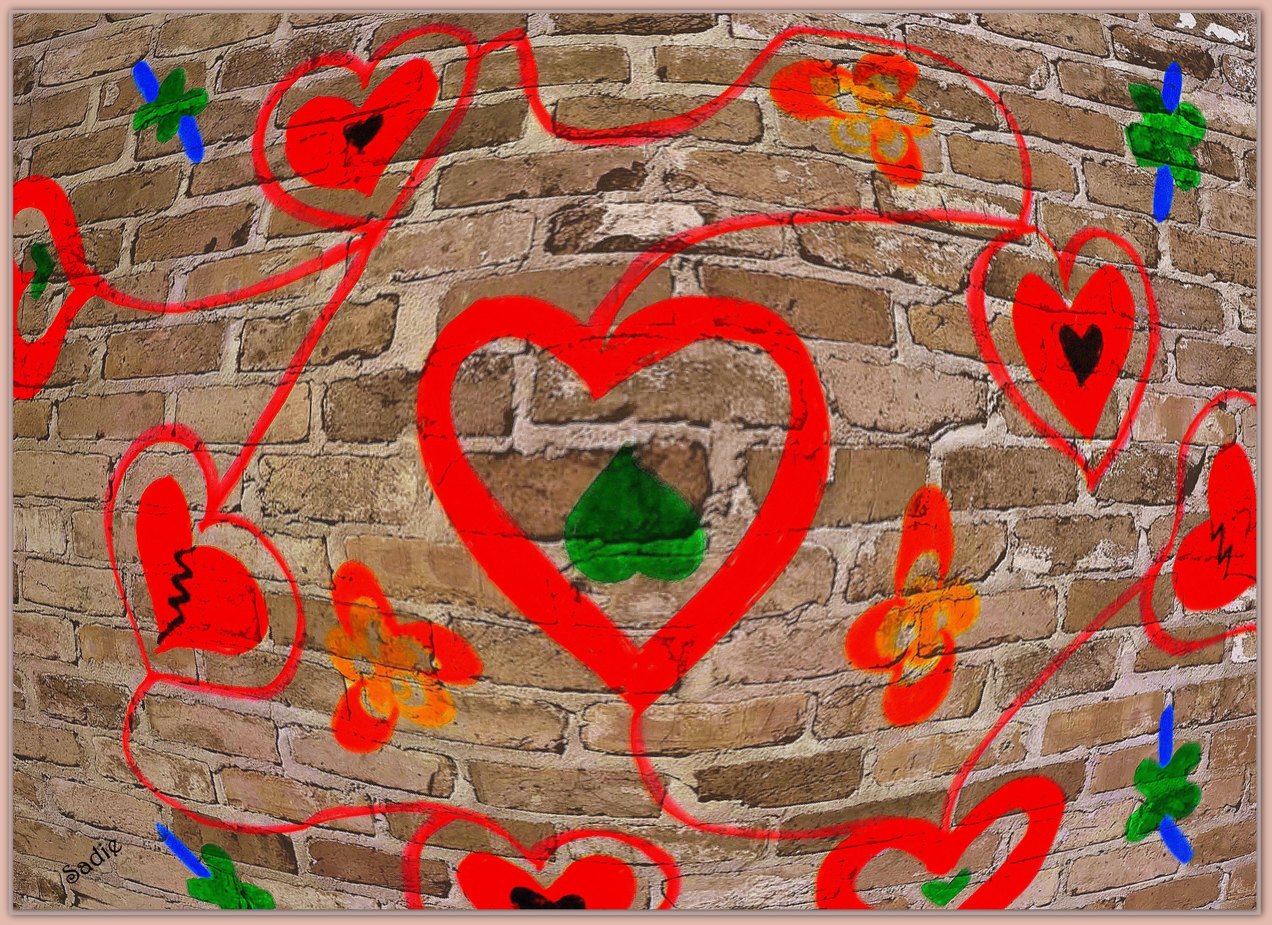 red green orange and blue flower and heart graffiti