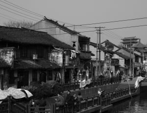grey scale photo of village houses thumbnail