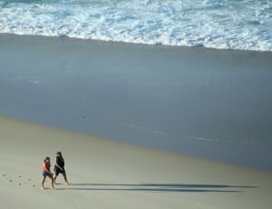 two woman on seashore thumbnail