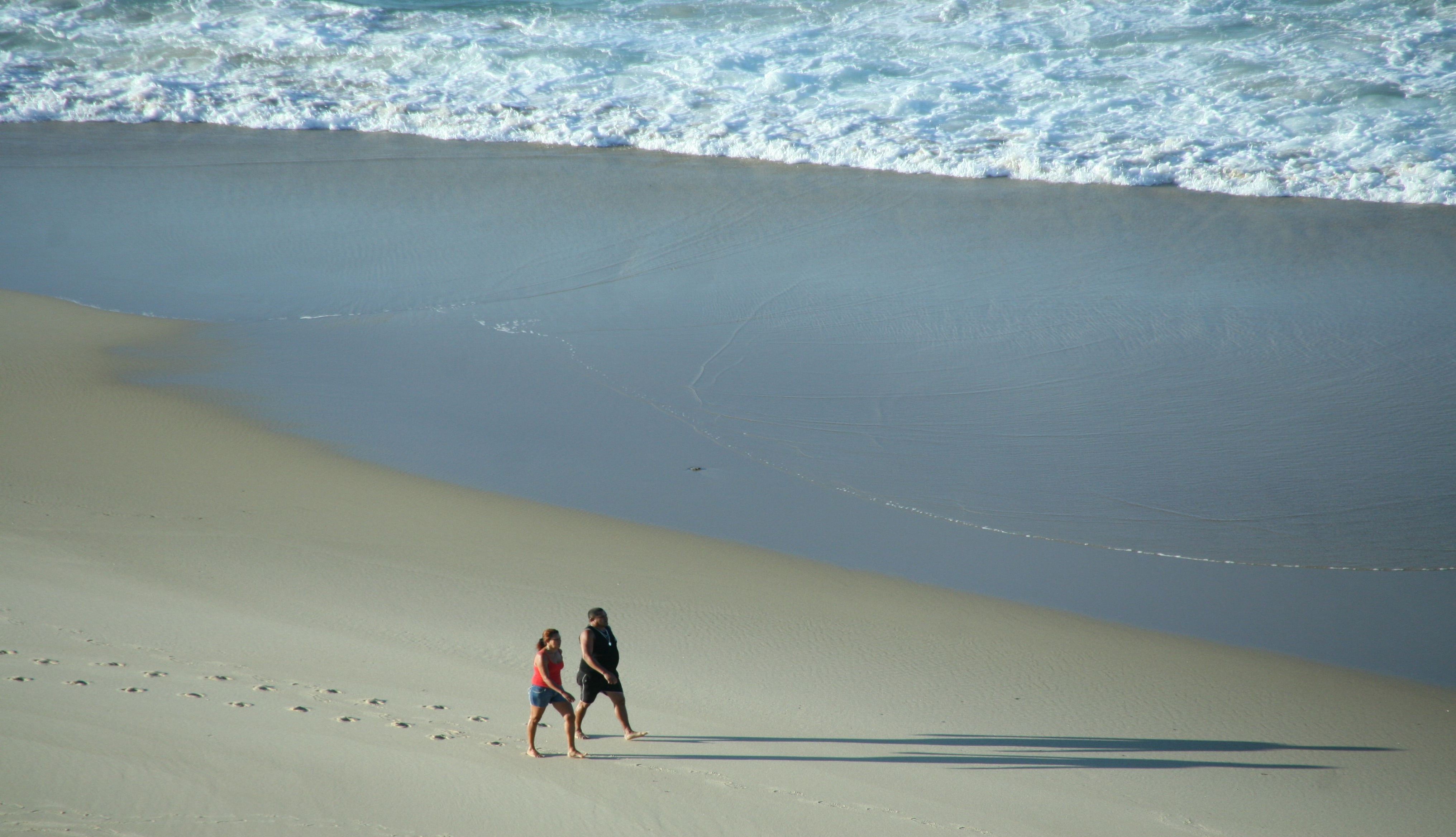 two woman on seashore