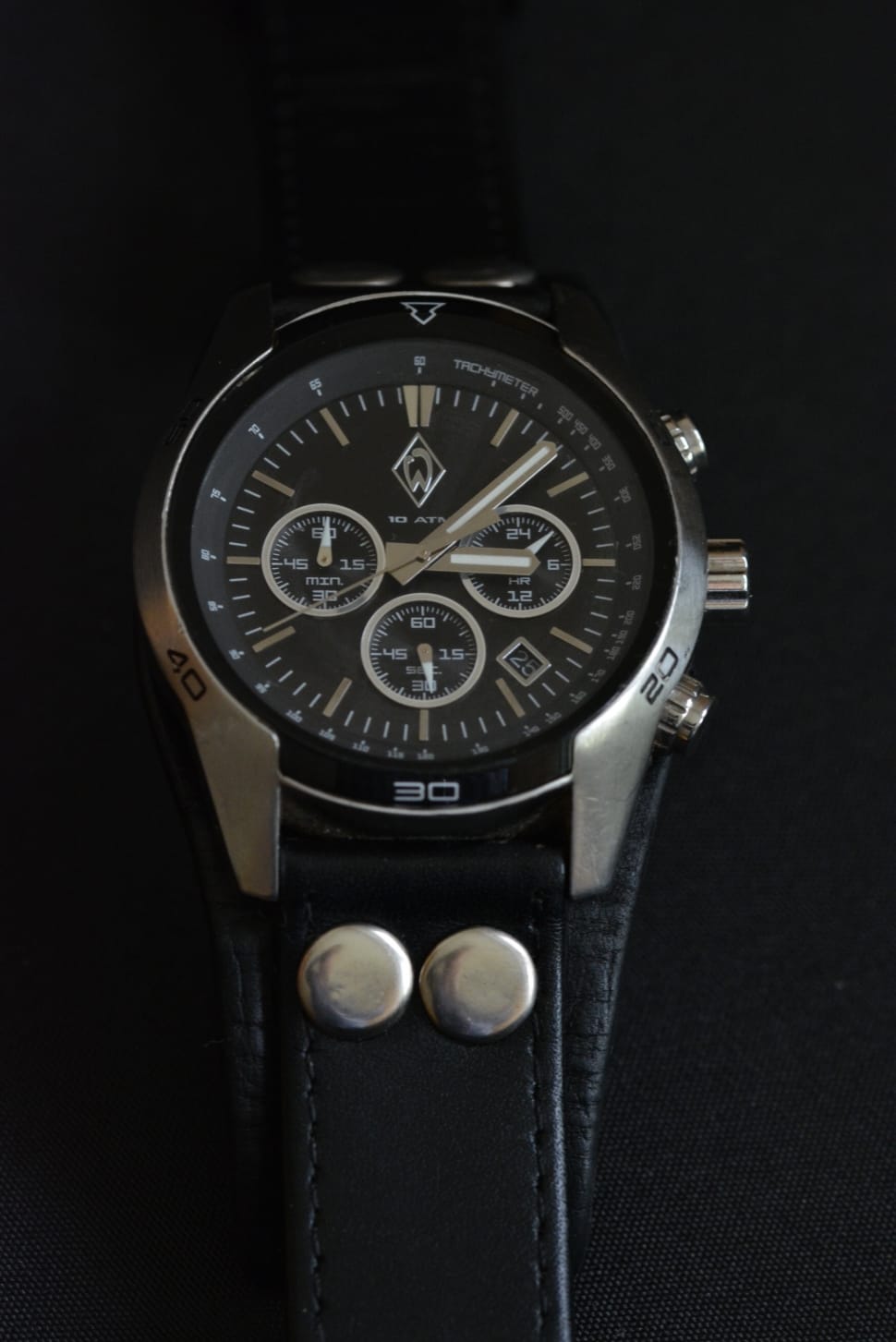 black leather strap black face round chronograph watch preview