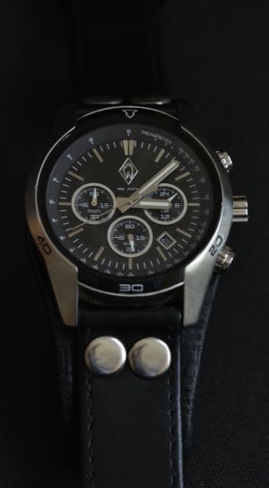 black leather strap black face round chronograph watch thumbnail