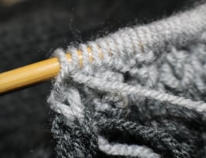 white and black knitted textile thumbnail