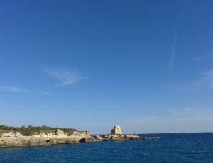 white rock tower on island thumbnail