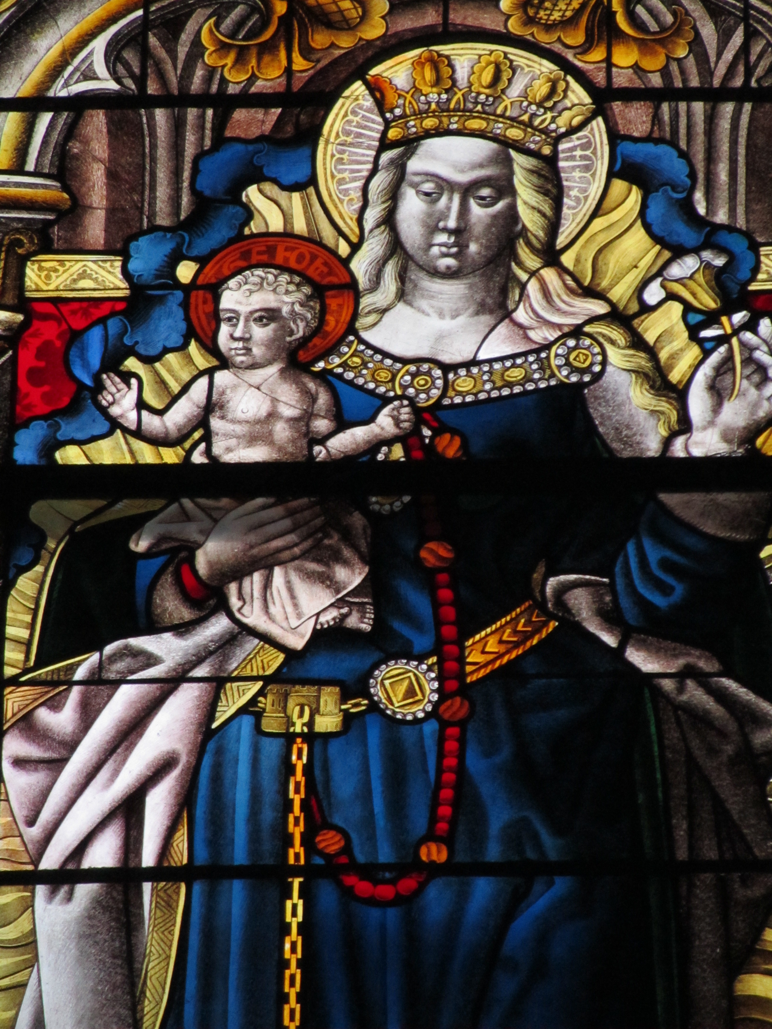 virgin mary and baby jesus glass window