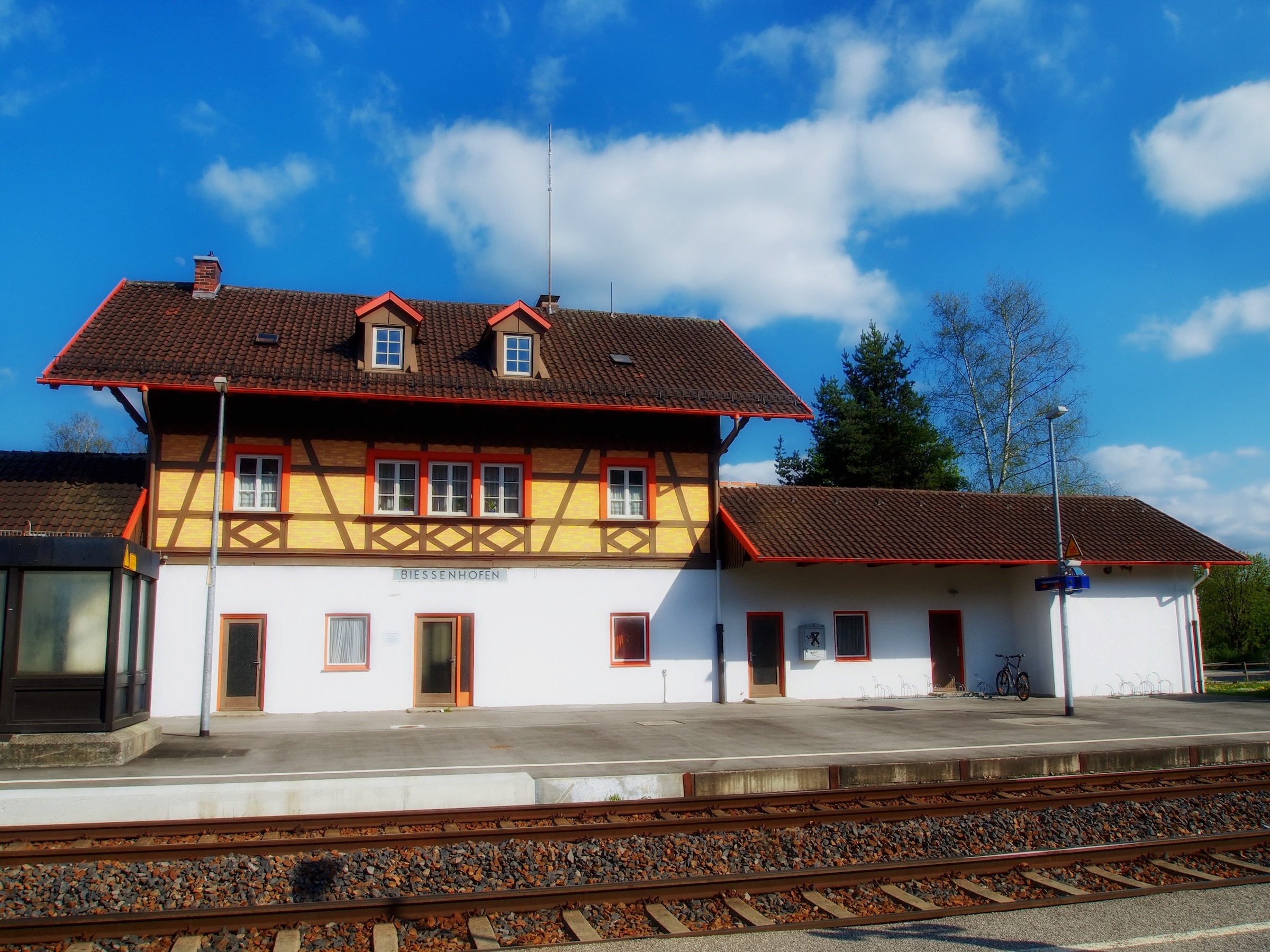 white-and-yellow 2-storey house