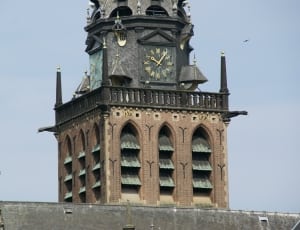 brown tower with clock thumbnail