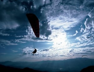 silhouette of person paragliding thumbnail