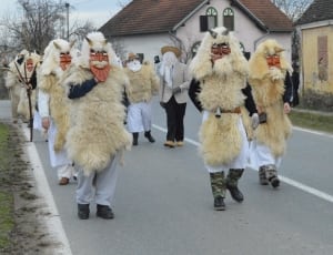 people in costume parade thumbnail