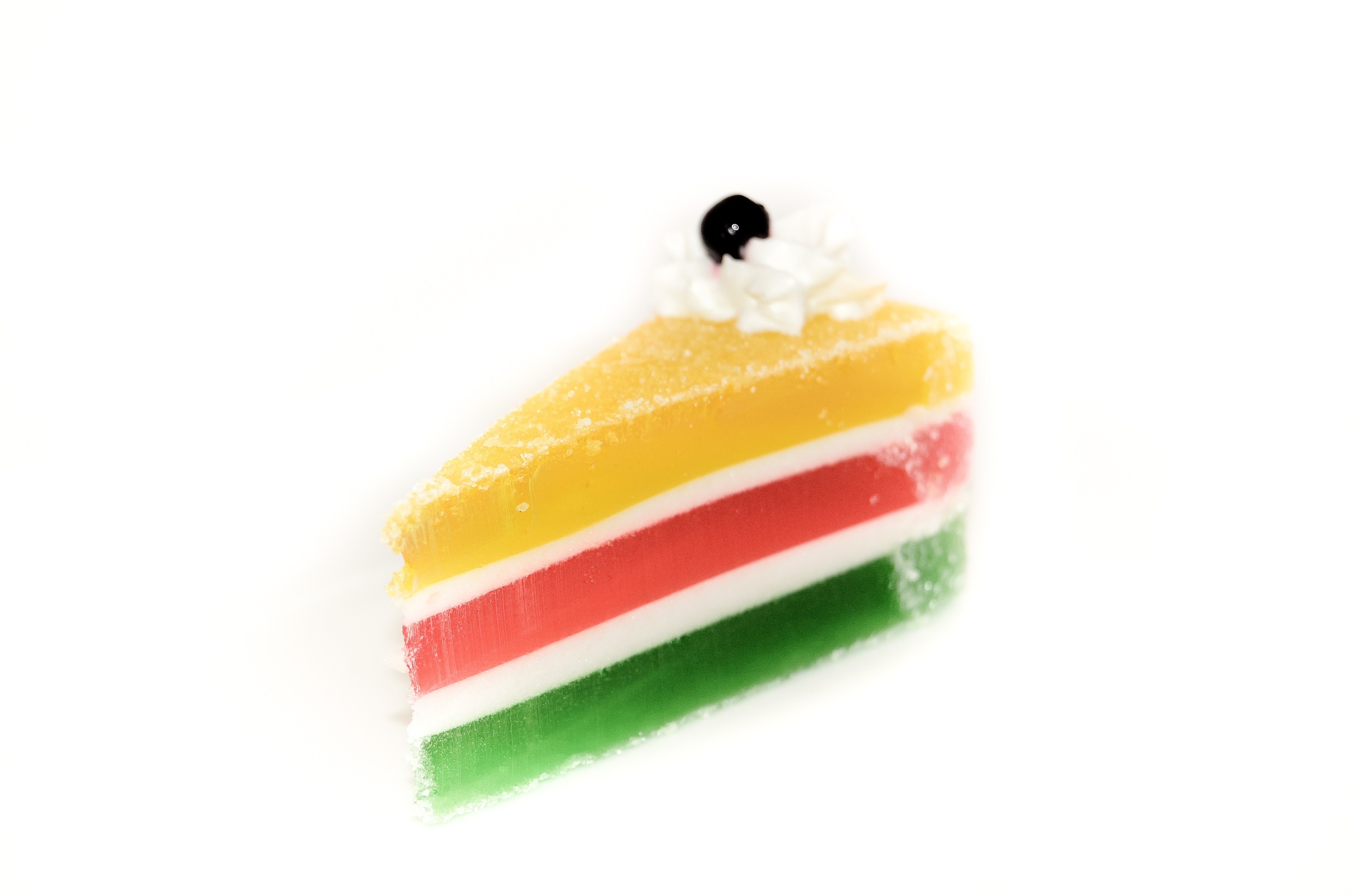 slice multi colored cake