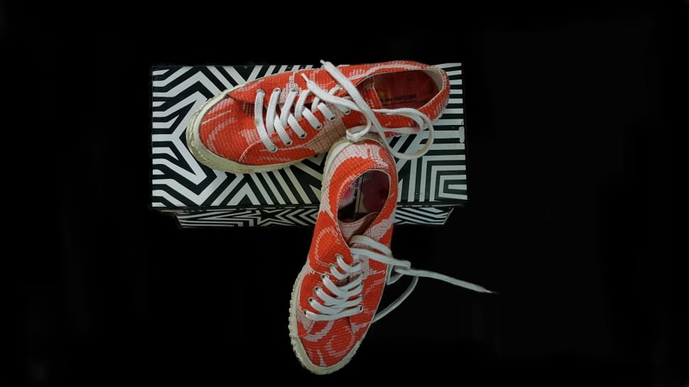 red and white low top sneakers and box preview
