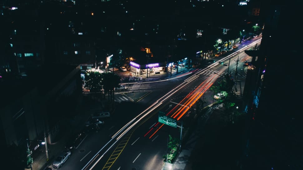 timelapse aerial photo of street at night preview