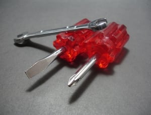 red handled star and flat screw and stainless steel open wrench thumbnail