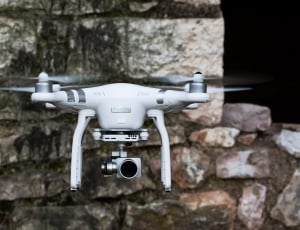 white quadcopter drone thumbnail