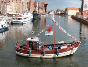 brown and white boat thumbnail