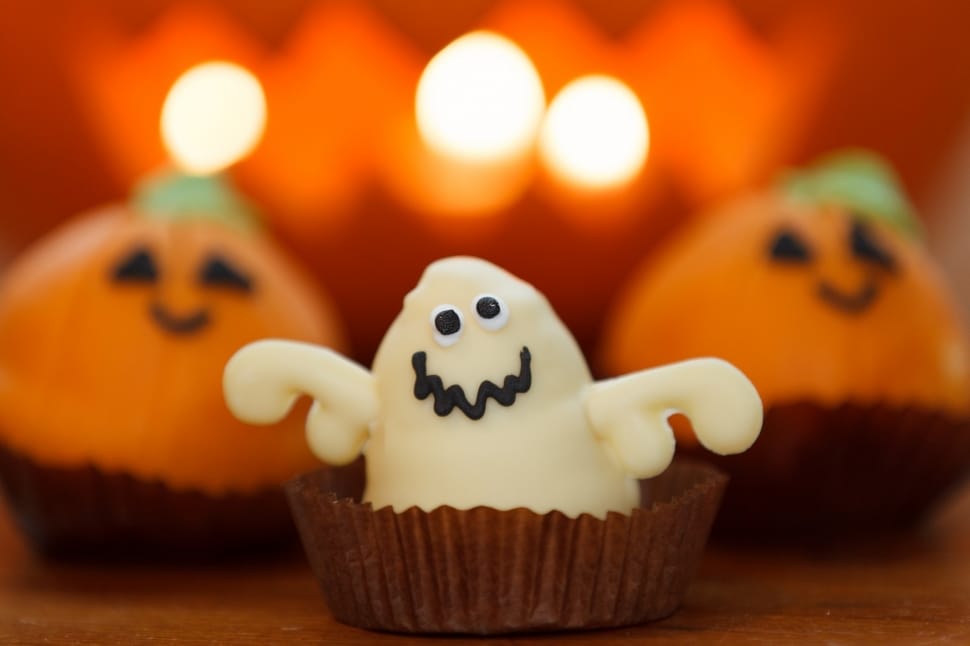 shallow depth of field photo of white ghost cupcake preview