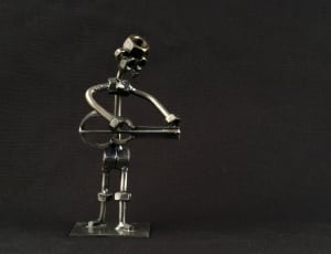 silver muts and bolts figurine thumbnail