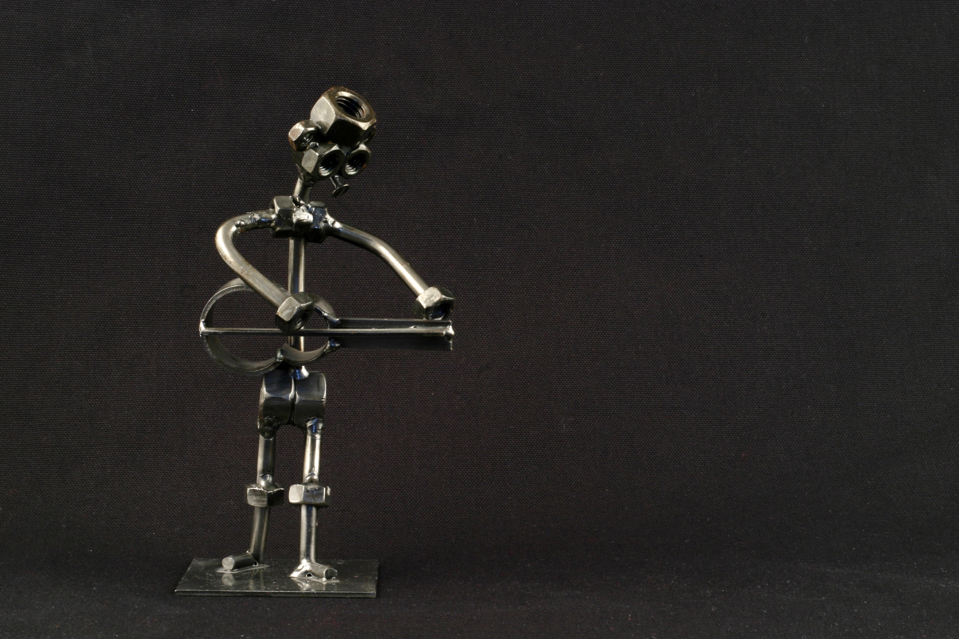 silver muts and bolts figurine