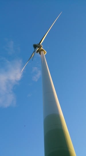 low angle photography of  wind mill under blue sky during daytime thumbnail