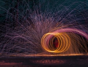 timelapse photo of person fire-dancing thumbnail