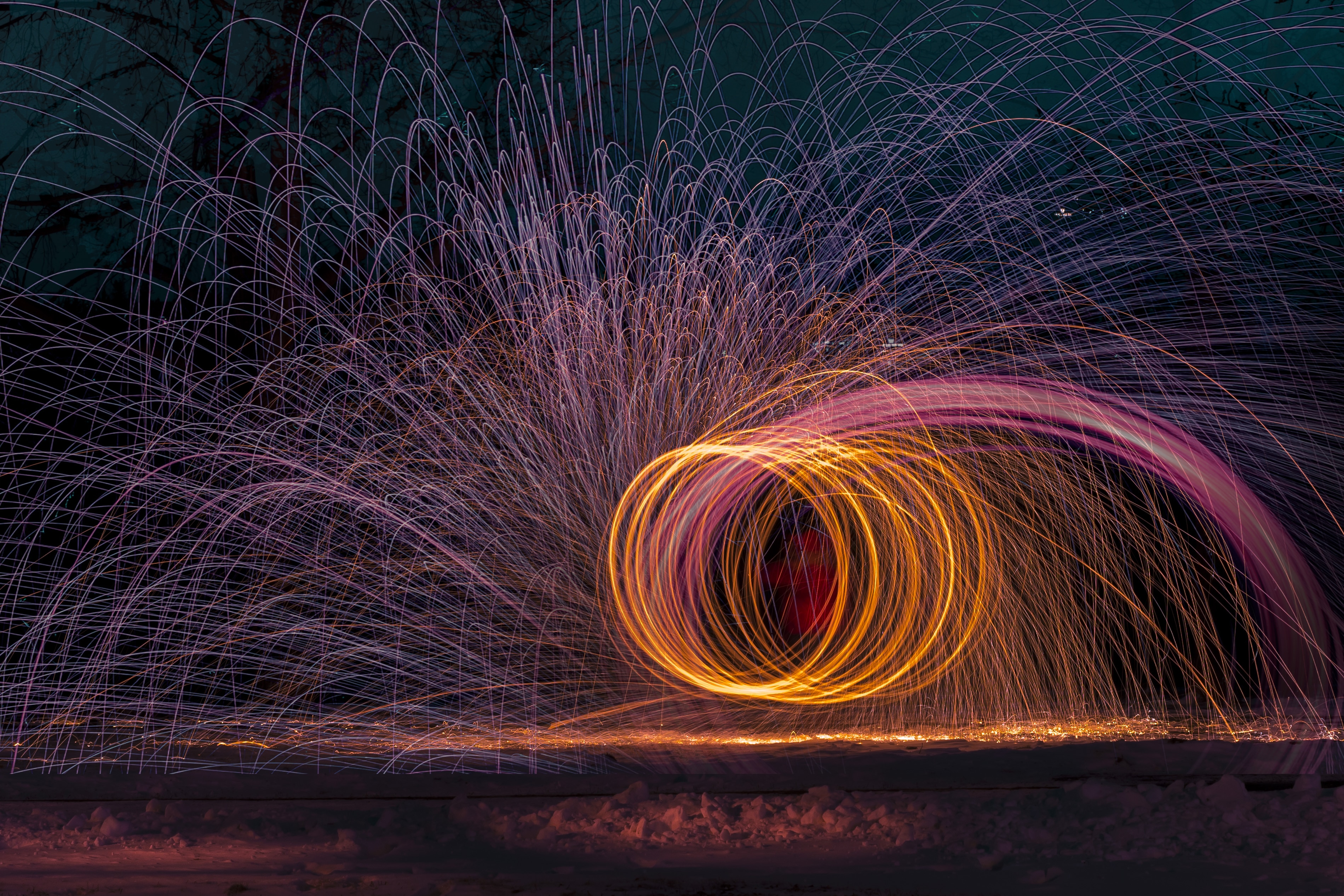 timelapse photo of person fire-dancing