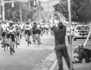 grayscale photo of cyclist parade thumbnail
