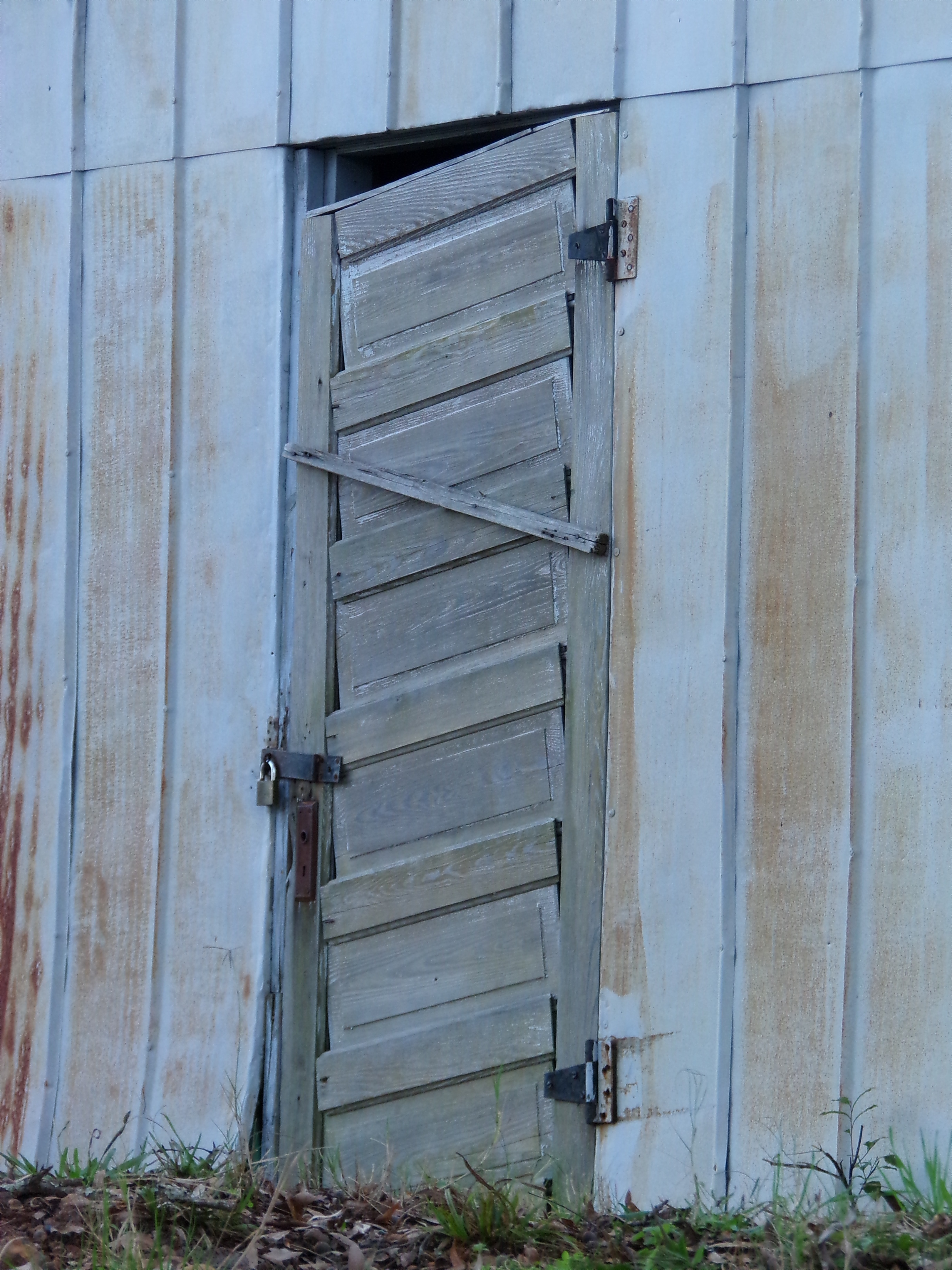 grey wooden door closed