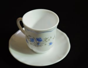 white and blue floral tea cup and saucer thumbnail