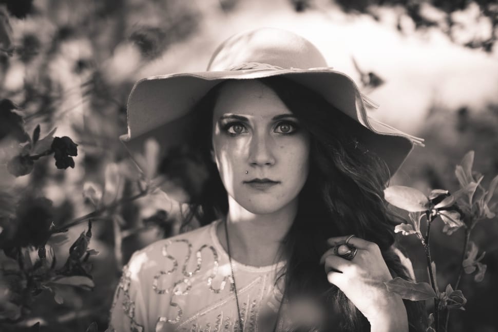grayscale photo of woman wearing hat preview