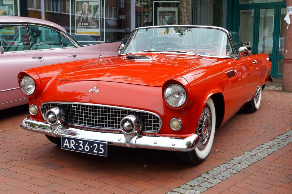 red classic convertible preview