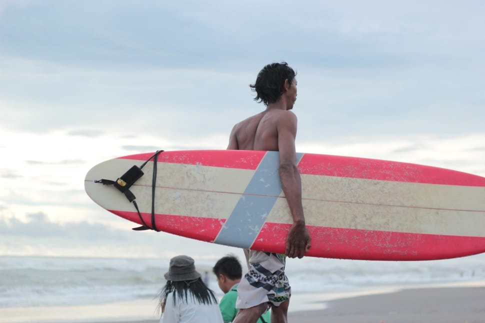 men's red and white surfboard preview