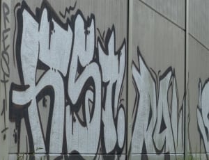white and black wall graffiti thumbnail